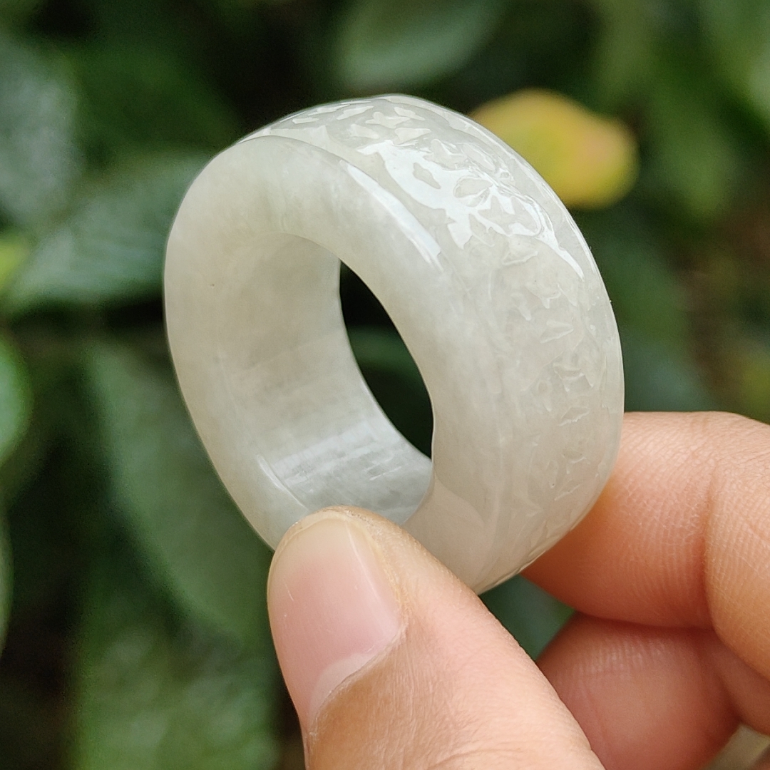 Hugh Jade Ring with coin rolls around