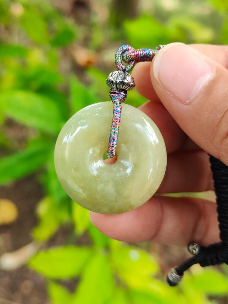 Jadeite Jade Pendants Video (Three) 10 yellow donut pendant